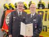 Bild - Jahreshauptversammlung der Freiwilligen Feuerwehr Borgstedt – Ehrung mit Schleswig-Holsteinischen Feuerwehrehrenkreuz in Bronze für Claus Schoof